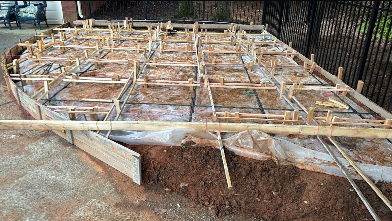 Complex curved wooden framing and rebar setup